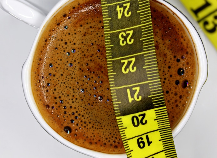 cup of Turkish coffee with measuring tape